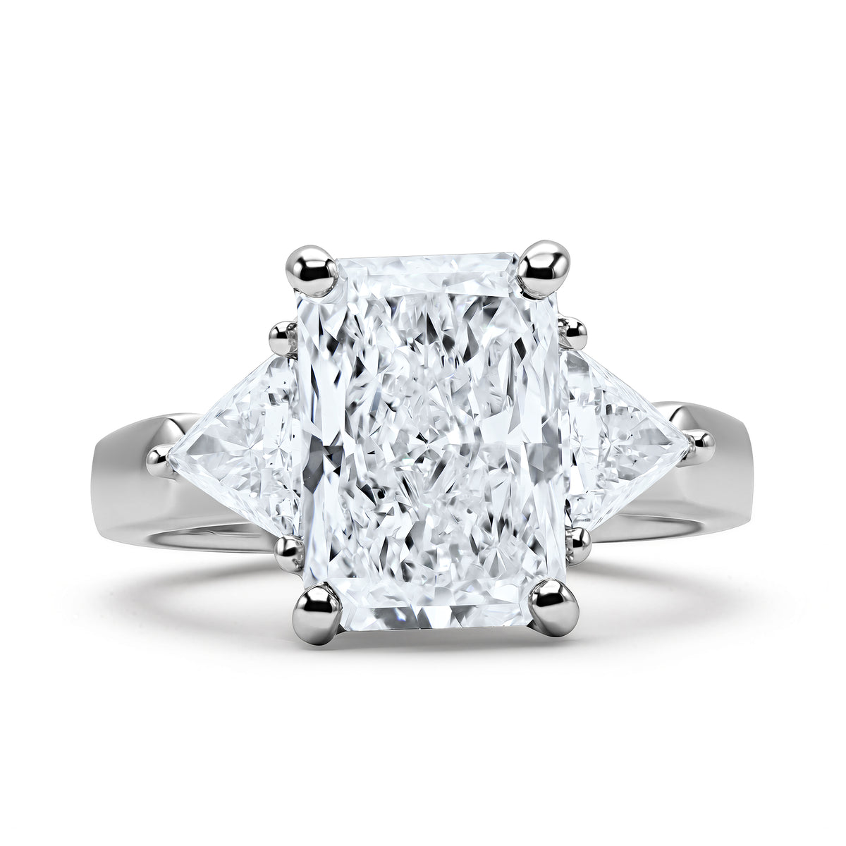 3.03 CTW radiant-cut diamond three-stone ring in platinum