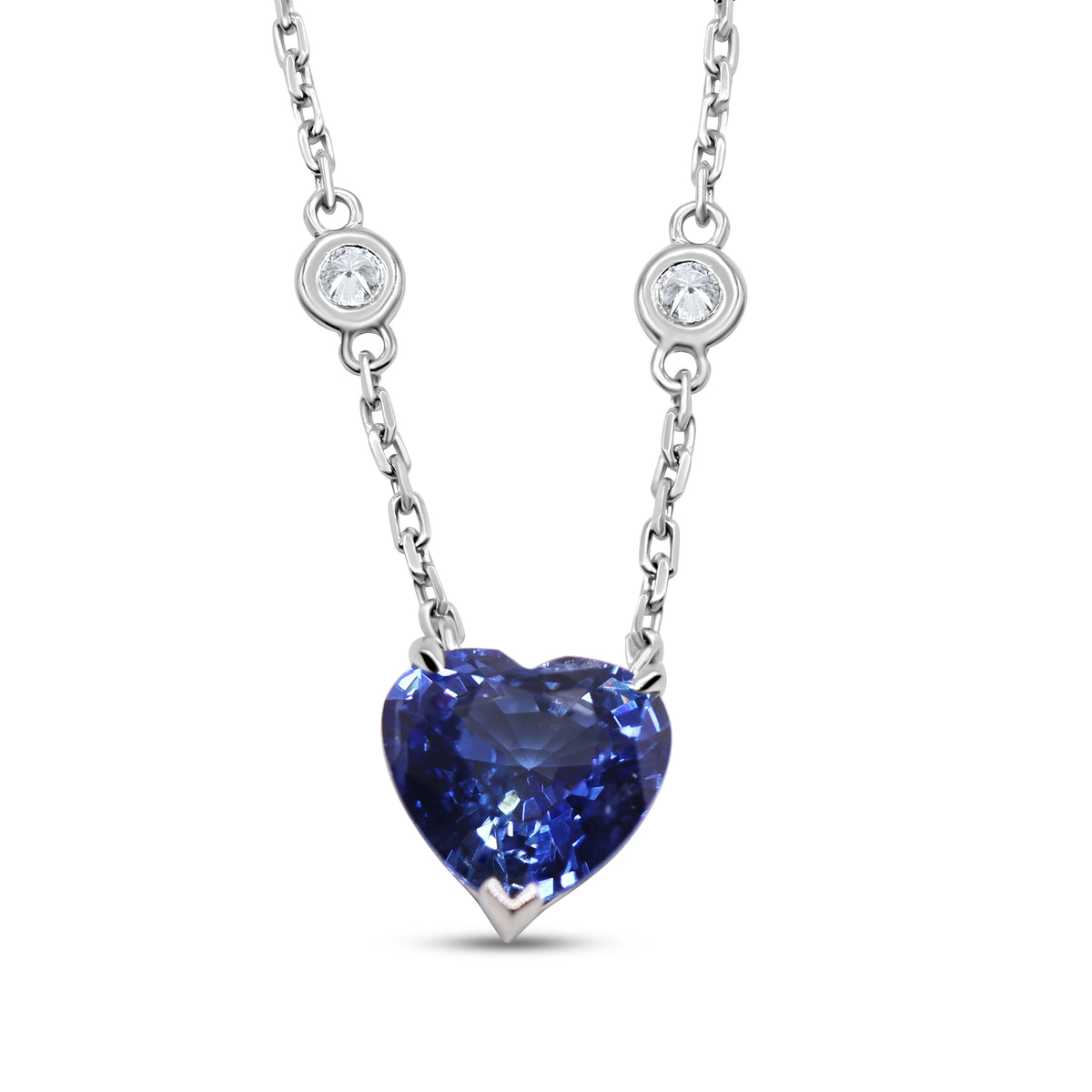 Blue sapphire heart and diamond necklace in 18K white gold