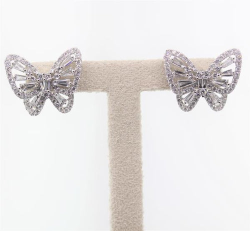 18k white gold diamond butterfly earrings with tapered baguettes and round brilliant cut diamonds weighing 1.71 carats total of F color, VS2 clarity.