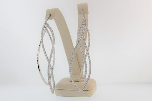 18k white gold diamond dangle earrings with round brilliant cut diamonds weighing 5.19 carats total of F color, VS2 clarity.