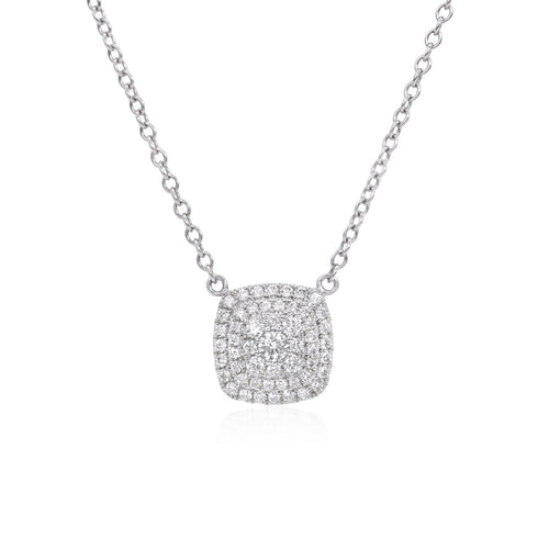 18k white gold diamond cluster necklace featuring round brilliant cut diamonds weighing .39 carats total of F color, VS2 clarity, and of excellent cut and brilliance.