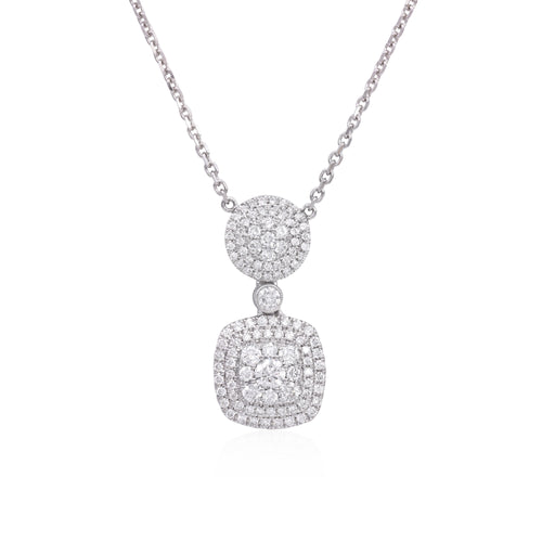 18k white gold diamond cluster necklace featuring round brilliant cut diamonds weighing .84 carats total of F color, VS2 clarity.