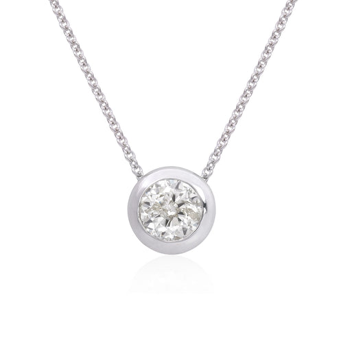 18k white gold diamond solitaire necklace, center diamond is a round brilliant cut diamond weighing 1.95 carats of H color, SI clarity.     Necklace measures 16