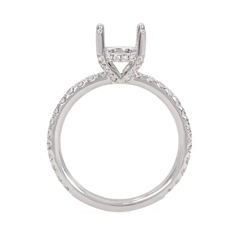 One handcrafted 18k white gold diamond engagement ring setting featuring round brilliant cut diamonds weighing .66  carats total of F color, VS2 clarity, and of excellent cut and brilliance.