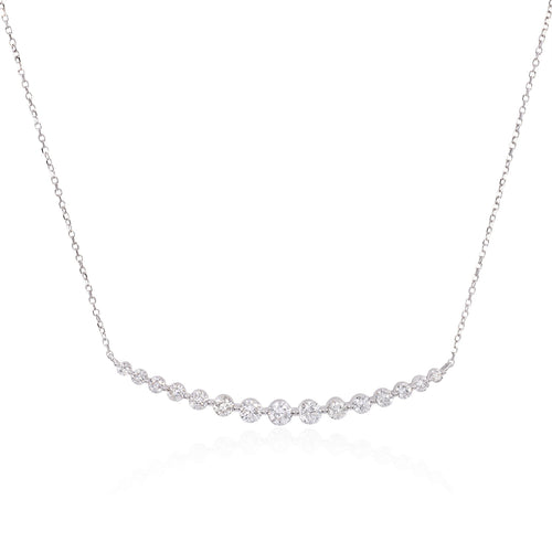 One handmade 14k white gold diamond necklace featuring 15 round brilliant cut diamonds weighing ,96 carats total of F color, VS2 clarity, and of excellent cut and brilliance.  Necklace measures 16
