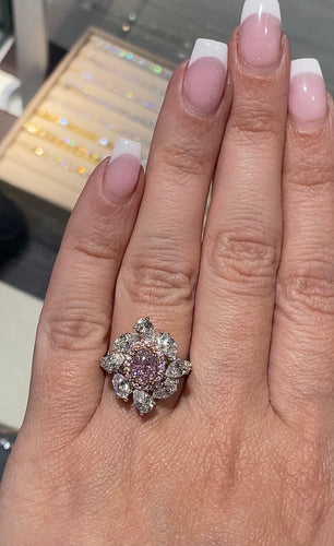 Natural pink diamond ring 18k two-tone White and rose gold     1.01 Carat Very Light Pink Oval (GIA certified)     VS1 Clarity     2.52 Carats surrounding the oval (NO HEAT TREATMENT)     Total Carats 3.53