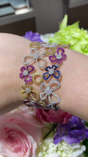 Stunning handmade multi-colored diamond bracelet with 4.60 carats total of F color, VS2 clarity.